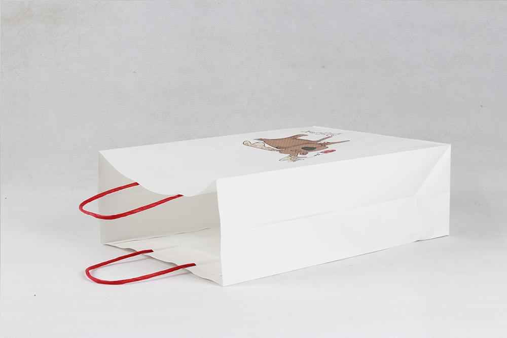 卡通鹿簡(jiǎn)約牛皮服裝紙袋定制 卡通鹿簡(jiǎn)約牛皮服裝紙袋定制