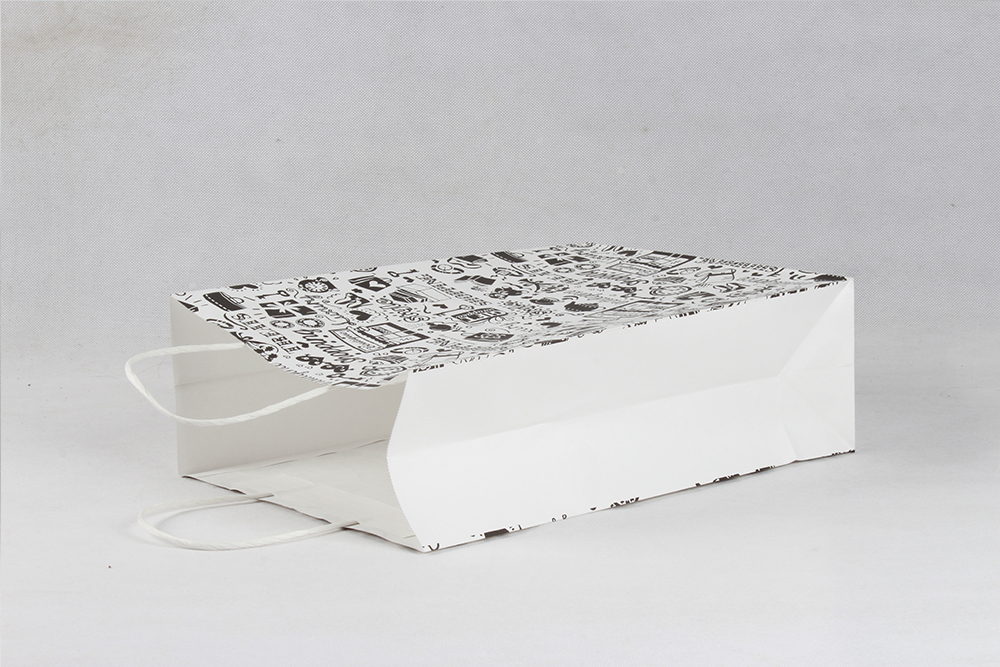 黑色卡通個性服裝牛皮紙袋定制 黑色卡通個性服裝牛皮紙袋定制